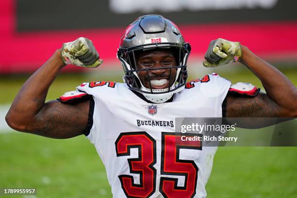 Jamel Dean of the Tampa Bay Buccaneers celebrates after breaking up a pass during the fourth quarter against the Tennessee Titans at Raymond James...