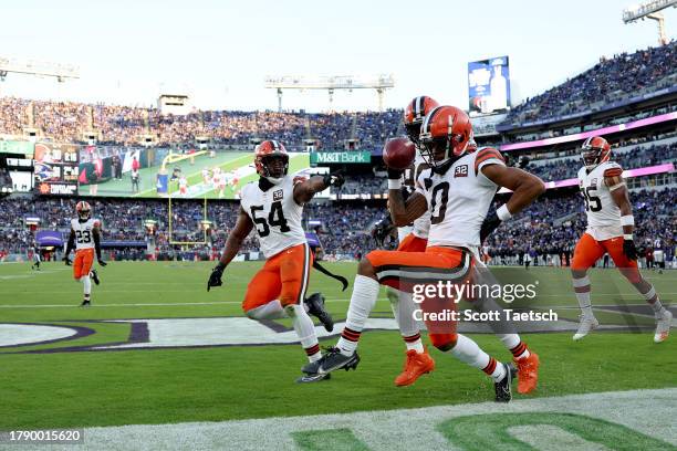 Greg Newsome II of the Cleveland Browns celebrates a touchdown against the Baltimore Ravens during the fourth quarter at M&T Bank Stadium on November...