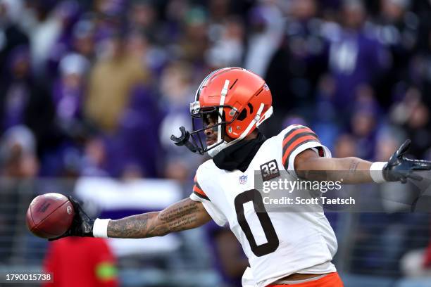 Greg Newsome II of the Cleveland Browns celebrates returning an interception for a touchdown against the Baltimore Ravens during the fourth quarter...