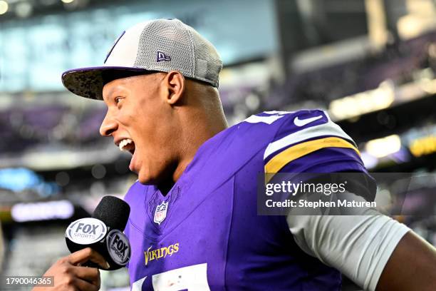 Joshua Dobbs of the Minnesota Vikings does an interview after the game against the New Orleans Saints at U.S. Bank Stadium on November 12, 2023 in...