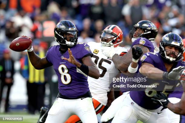 Lamar Jackson of the Baltimore Ravens throws a pass against the Cleveland Browns during the fourth quarter at M&T Bank Stadium on November 12, 2023...