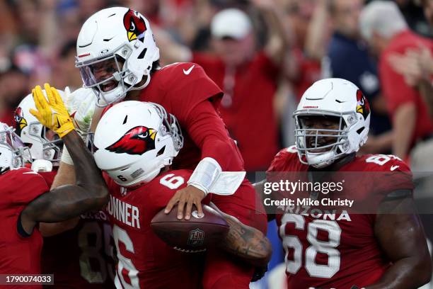 Kyler Murray of the Arizona Cardinals celebrates a touchdown with James Conner against the Atlanta Falcons during the second quarter at State Farm...