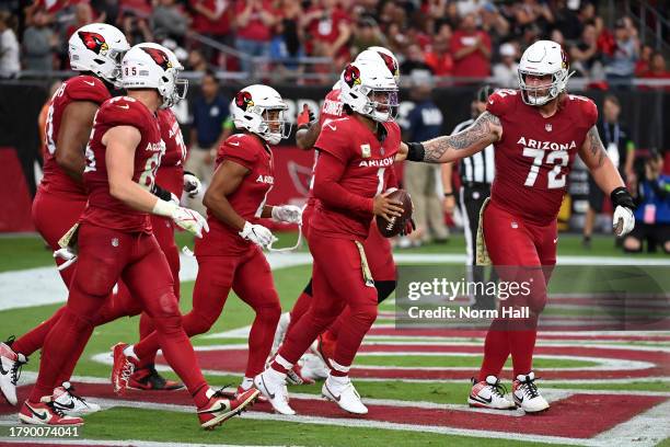 Kyler Murray of the Arizona Cardinals celebrates a touchdown with teammates against the Atlanta Falcons during the second quarter at State Farm...