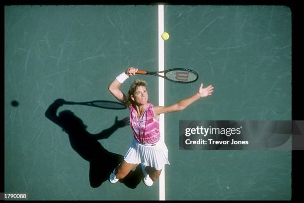 Chris Evert-Lloyd serves the ball during a match. Mandatory Credit: Trevor Jones /Allsport