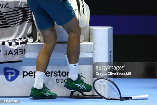 Novak Djokovic smashes his racket in frustration during day one of the Nitto ATP Finals at Pala Alpitour on November 12, 2023 in Turin, Italy.