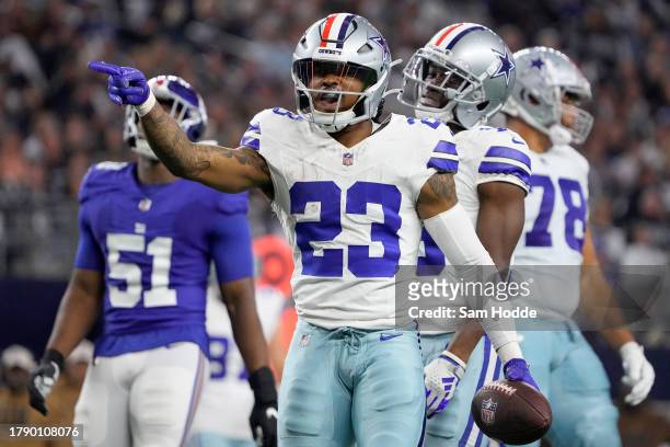 Rico Dowdle of the Dallas Cowboys celebrates after making a first down during the second quarter against the New York Giants at AT&T Stadium on...