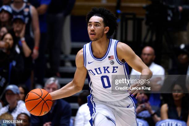 Jared McCain of the Duke Blue Devils dribbles up court against the Bucknell Bison during the game at Cameron Indoor Stadium on November 17, 2023 in...