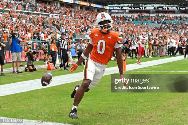 Miami wide receiver Brashard Smith celebrates scoring a 34 yard touchdown in the second quarter as the Miami Hurricanes faced the Louisville...