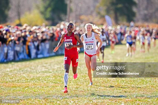 Hilda Olemomoi of the Alabama Crimson Tide approaches the finish line during the Division I Men's and Women's Cross Country Championship held at...