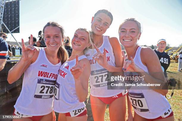 The North Carolina State Wolfpack celebrate after the win during the Division I Men's and Women's Cross Country Championship held at Panorama Farms...