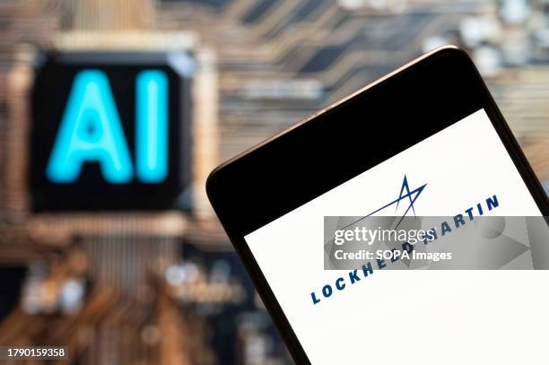 In this photo illustration, the American aerospace, arms, defense, information security, and technology corporation Lockheed Martin logo seen...