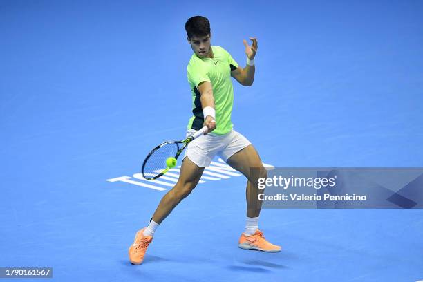 Carlos Alcaraz of Spain plays a forehand against Novak Djokovic of Serbia during the Men's Singles Semi Final match on day seven of the Nitto ATP...