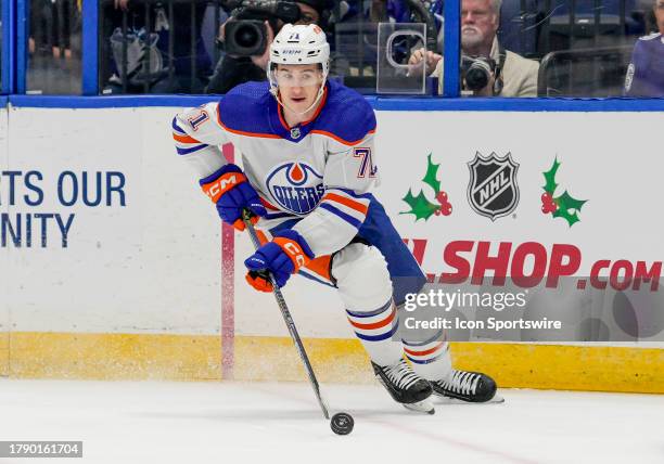 Edmonton Oilers center Ryan McLeod skates with the puck during the NHL Hockey match between the Tampa Bay Lightning and Edmonton Oilers on November...