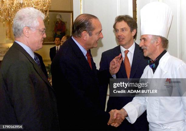 France's Prime Minister Lionel Jospin and President Jacques Chirac meet Swiss chef Anton Mossiman as Britain's Prime Minister Tony Blair looks on...