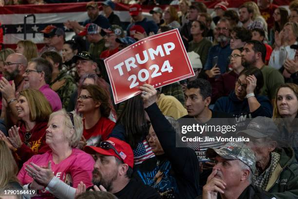 Supporter of Donald Trump holds up a pro Trump sign during a rally at the Fort Dodge Senior High School on November 18, 2023 in Fort Dodge, Iowa....