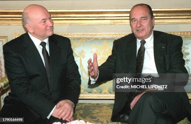 French President Jacques Chirac gestures to Moscow mayor Yuri Luzhkov prior to their talks at the Elysee Palace Friday March 26, 1999. Luzhkov...