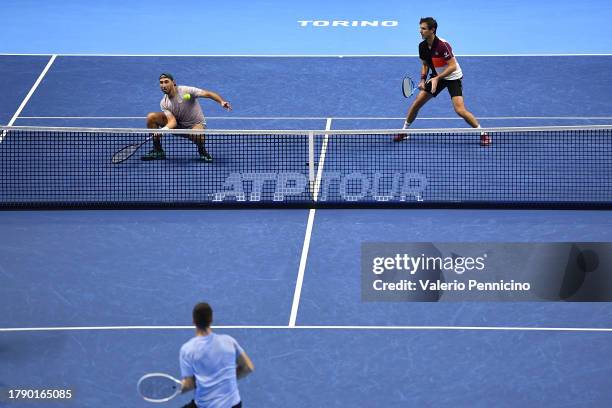 Edouard Roger-Vasselin of France and Santiago Gonzalez of Mexico in action against Joe Salisbury of Great Britain and Rajeev Ram of United States...