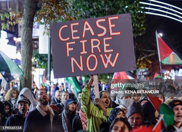 Demonstrators in support of Palestinians hold a rally to call for a ceasefire, in the Brooklyn borough of New York City on November 18, 2023. Israel...