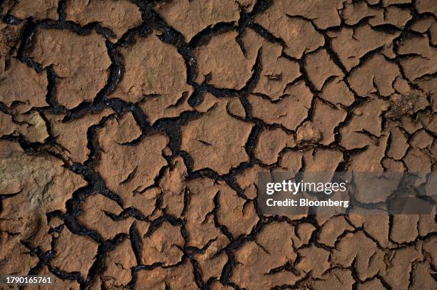 Oil remnants on the shoreline of Lake Maracaibo in Cabimas, Zulia state, Venezuela, on Wednesday, Nov. 15, 2023. A decision by the US on Oct. 18 to...