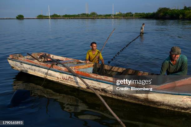 Fishermen on Lake Maracaibo in Cabimas, Zulia state, Venezuela, on Friday, Nov. 17, 2023. A decision by the US on Oct. 18 to ease sanctions in...