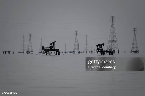 Oil rigs on Lake Maracaibo in Cabimas, Zulia state, Venezuela, on Wednesday, Nov. 15, 2023. A decision by the US on Oct. 18 to ease sanctions in...
