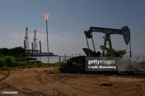 Petroleos de Venezuela SA oil pumpjack on Lake Maracaibo in Cabimas, Zulia state, Venezuela, on Friday, Nov. 17, 2023. A decision by the US on Oct....