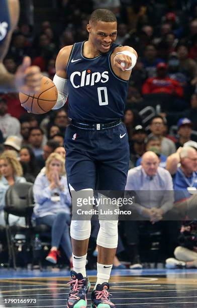 Los Angeles, CA - Clippers guard Russell Westbrook brings the ball up court against the Rockets in the first half of a 106-100 L.A. Victory at...