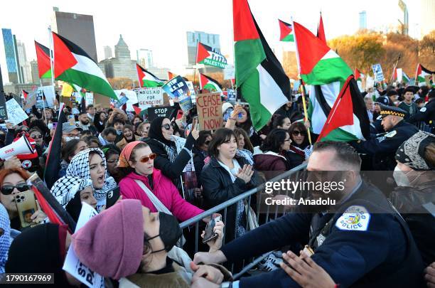 Pro-Palestinian demonstrators hold a rally near Buckingham Fountain on Nov. 18 in Chicago, USA. Protestors and Chicago police clashed onto DuSable...