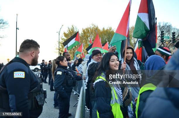 Pro-Palestinian demonstrators hold a rally near Buckingham Fountain on Nov. 18 in Chicago, USA. Protestors and Chicago police clashed onto DuSable...