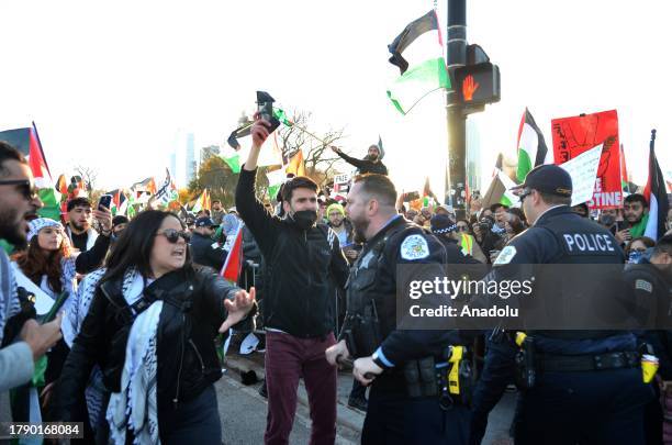 Pro-Palestinian demonstrators hold a rally near Buckingham Fountain on Nov. 18 in Chicago, USA. Protestors and Chicago police clashed onto DuSable...