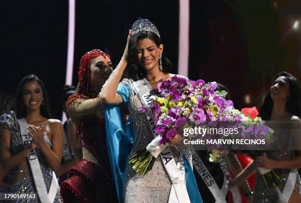 Miss Universe 2022, R'Bonney Gabriel of US, puts the crown on Miss Universe 2023, Sheynnis Palacios, after she won the 72th edition of the Miss...