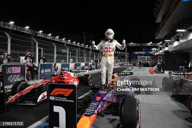 Red Bull Racing's Dutch driver Max Verstappen celebrates winning the Las Vegas Formula One Grand Prix on November 18 in Las Vegas, Nevada.