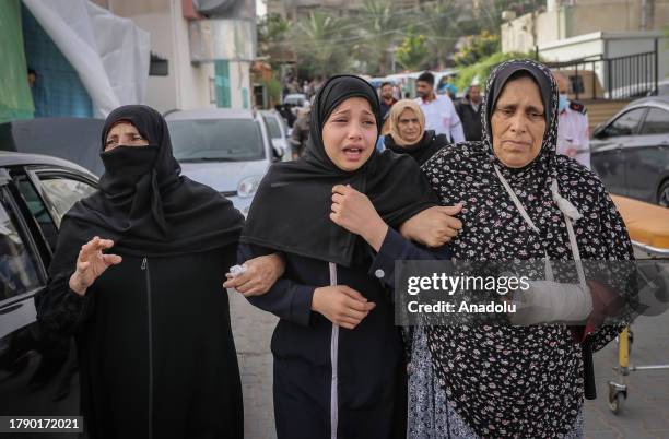 Relatives of the deceased mourn at Nasser Hospital, where the bodies of those who lost their lives in Israeli attacks were brought as Israeli attacks...