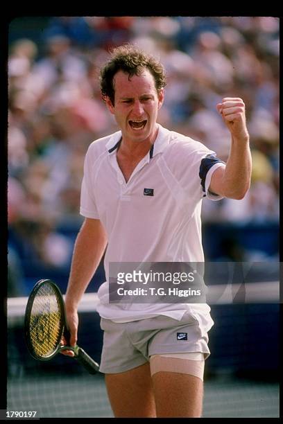 John McEnroe stands on the court during a match. Mandatory Credit: T. G. Higgins /Allsport