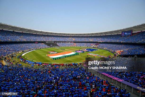 The national flags of India and Australia are displayed before the start of the 2023 ICC Men's Cricket World Cup one-day international final match...