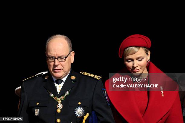 Prince Albert II of Monaco and Princess Charlene of Monaco exit the Monaco cathedral as they attend ceremonies marking the National Day in Monaco, on...