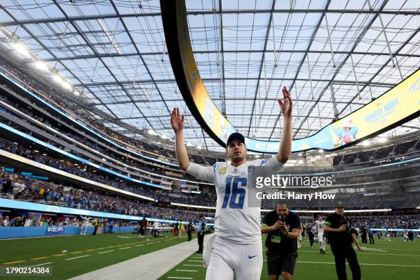 Jared Goff of the Detroit Lions celebrates as he walks off the field after beating the Los Angeles Chargers at SoFi Stadium on November 12, 2023 in...