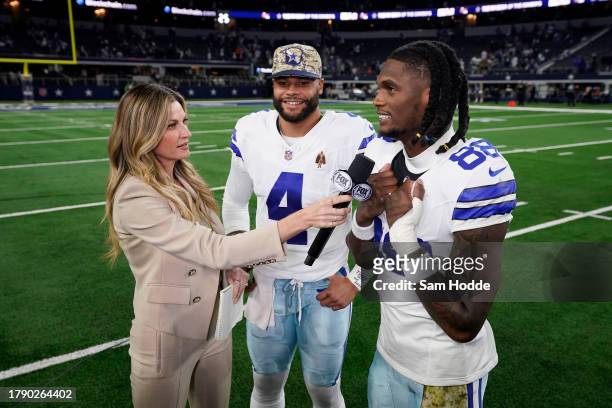 CeeDee Lamb of the Dallas Cowboys and Dak Prescott of the Dallas Cowboys are interviewed by Erin Andrews after the game against the New York Giants...