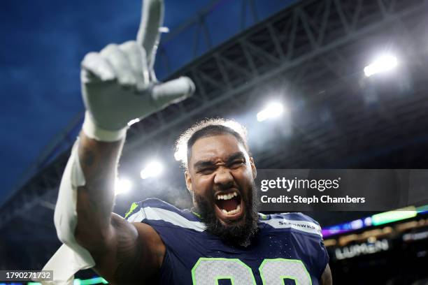 Leonard Williams of the Seattle Seahawks celebrates after his team's 29-26 win against the Washington Commandersat Lumen Field on November 12, 2023...