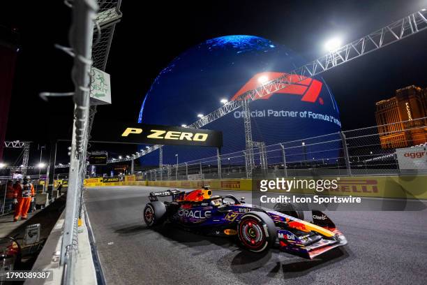 Red Bull Racing driver Max Verstappen of the Netherlands drives by the Sphere during the F1 Las Vegas Grand Prix on Saturday, November 18, 2023 on...