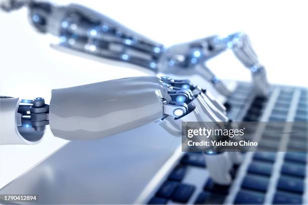 robot using laptop computer - rpa stock pictures, royalty-free photos & images