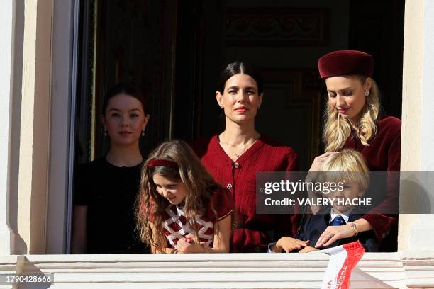 Alexandra of Hanover, India Casiraghi, Charlotte Casiraghi, Stefano Ercole Carlo Casiraghi, and Beatrice Borromeo, look out from the balcony of the...