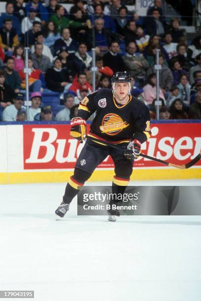 Pavel Bure of the Vancouver Canucks skates on the ice during an NHL game against the New York Islanders on January 9, 1993 at the Nassau Coliseum in...