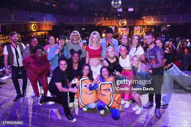 Performers pose onstage at Nashville 2000s Dance Party to End ALZ benefiting the Alzheimer's Association at Wildhorse Saloon on November 12, 2023 in...