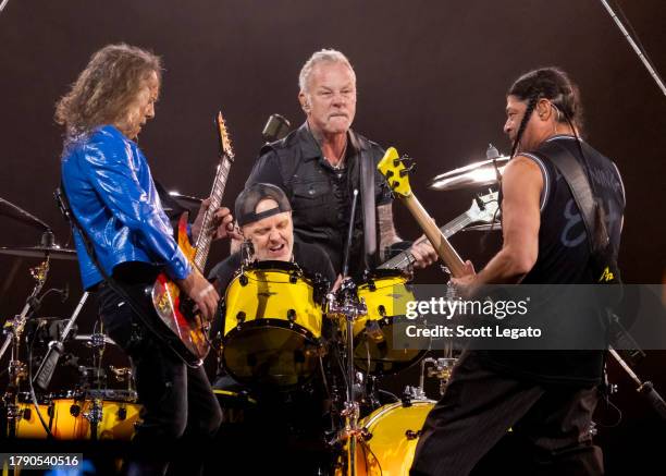 Kirk Hammett, Lars Ulrich, James Hetfield and Robert Trujillo of Metallica perform at Ford Field on November 12, 2023 in Detroit, Michigan.