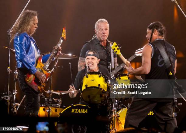 Kirk Hammett, Lars Ulrich, James Hetfield and Robert Trujillo of Metallica perform at Ford Field on November 12, 2023 in Detroit, Michigan.