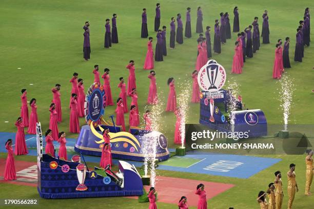 Dancers perform during the 2023 ICC Men's Cricket World Cup one-day international final match between India and Australia at the Narendra Modi...