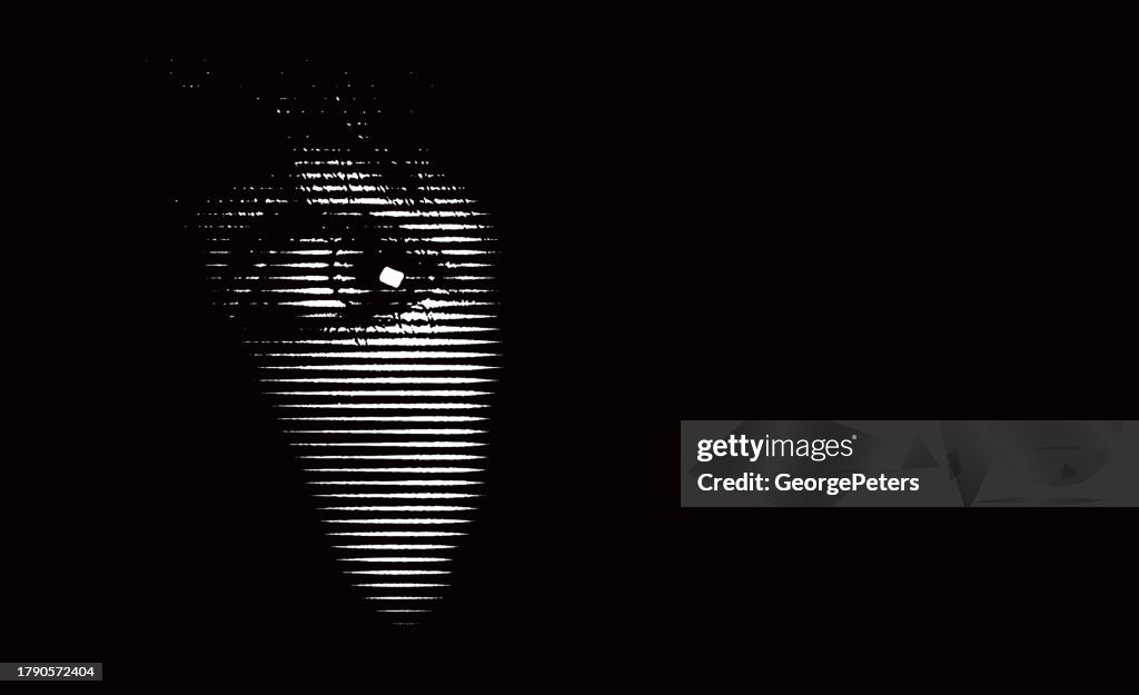 Terrified eye peeking in the dark