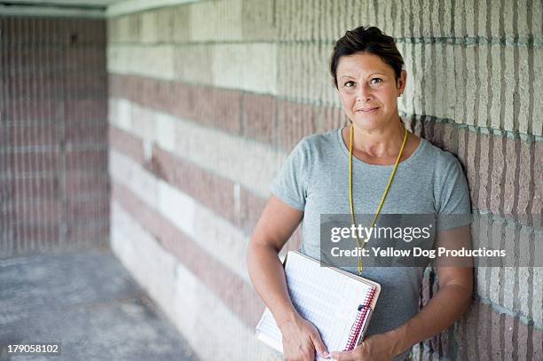 portrait of girls' softball coach - talent team coaching stock-fotos und bilder