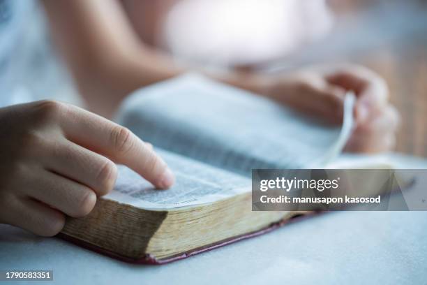 the bible. - holy-spirit-catholic-elementary-school stock pictures, royalty-free photos & images